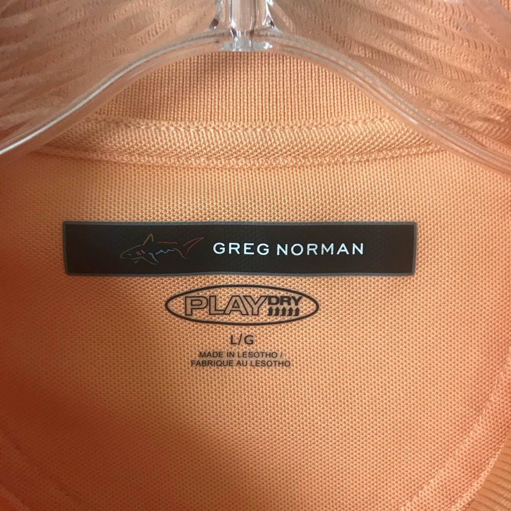 Greg Norman orange short sleeve polo